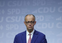 As Germany’s far right rises, weakened Merz looks to project strength and resolve against Putin