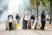 French government calls crisis meeting as some school blockades turn violent